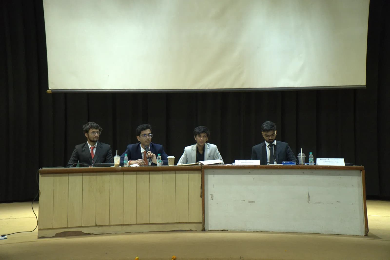 The executive board seated at the head table during committee
